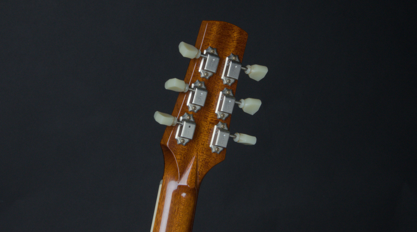 v-joint and tuner detail of guitar 21